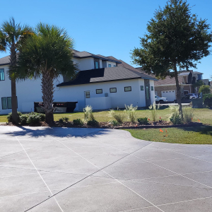 Pavers used to create a stunning tan driveway. Hardscape&#039;s done in Myrtle Beach