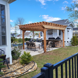 pergola in brown built in a residential yard in Myrtle Beach