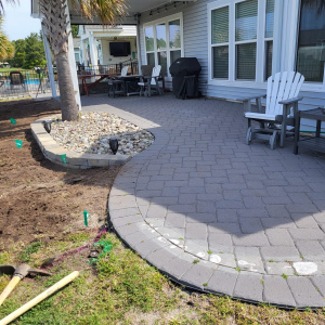 patio paver installation behind back of a house in Myrtle Beach