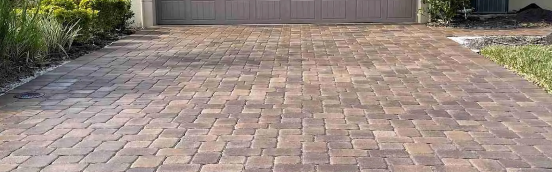Vibrant, well-maintained paver driveway, showcasing the enhanced color and protection provided by professional paver sealing in Myrtle Beach