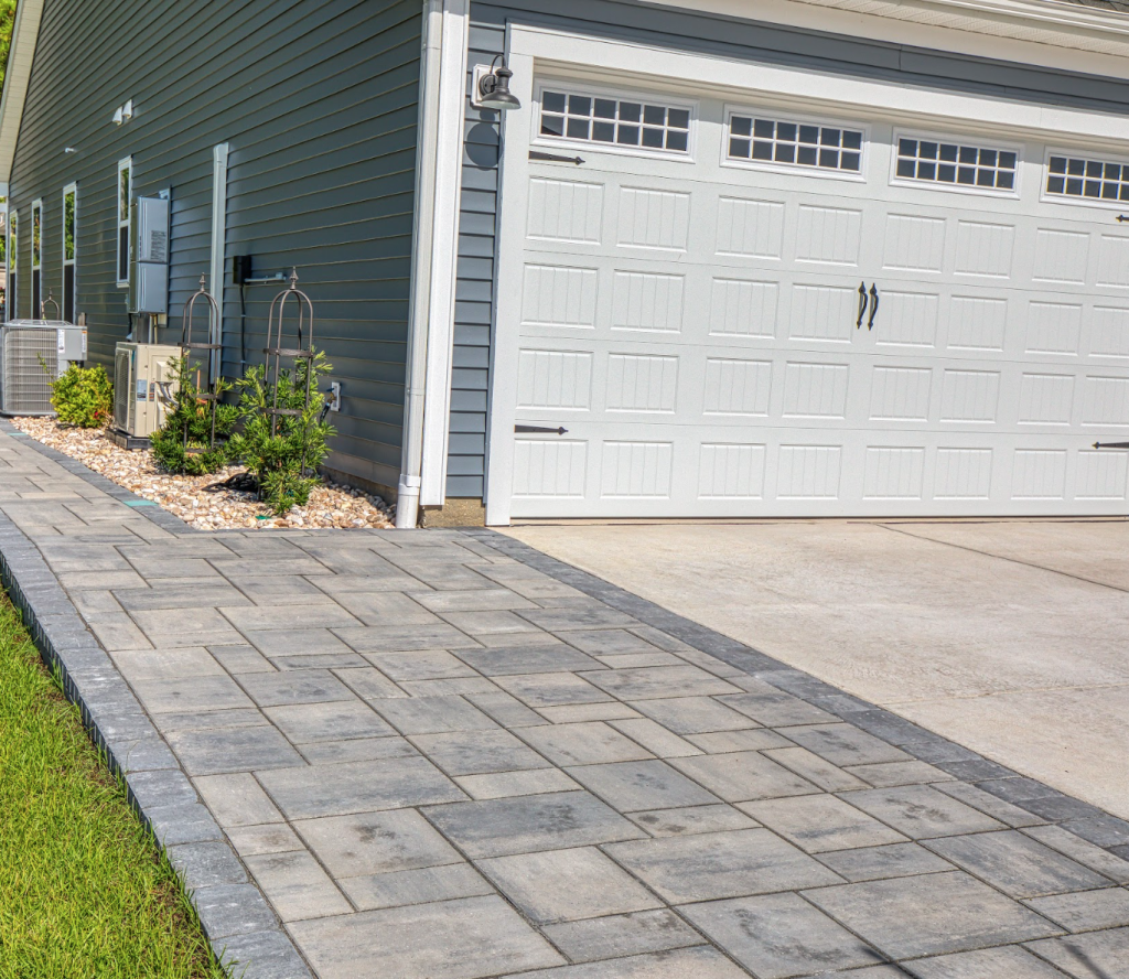 concrete driveway with paver extension 