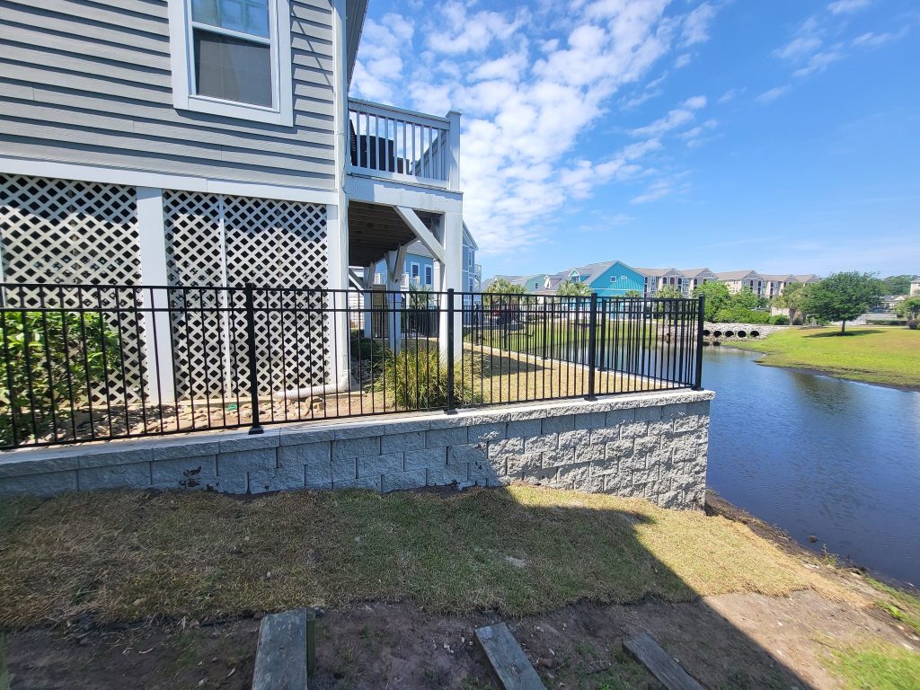 retaining wall at the grand dunes intercostal waterway installed by elite coastal landscaping